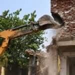 दिल्ली के वज़ीरपुर में पूर्वांचलियों के आशियानों पर चला बुलडोज़र, सियासत तेज़; भारी आक्रोश